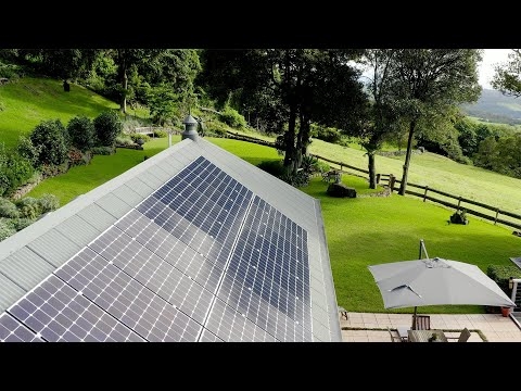 How do high quality solar panels with microinverter technology overcome shading issues?